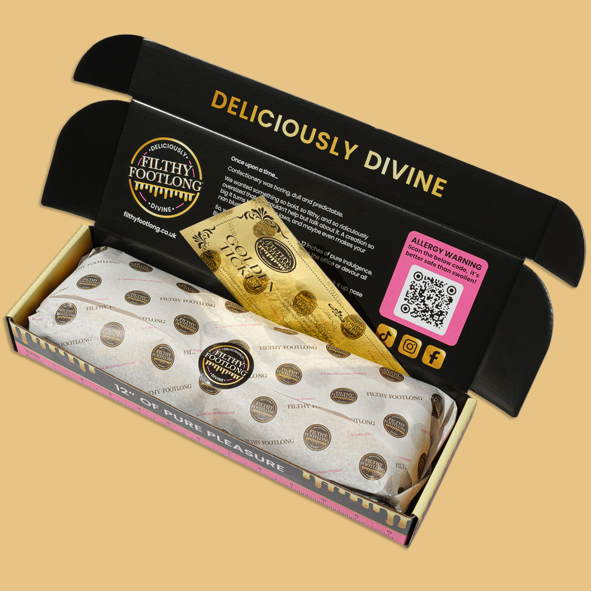 Open packaging of 'Deliciously Divine' with a gold bar and product inside on a beige background.