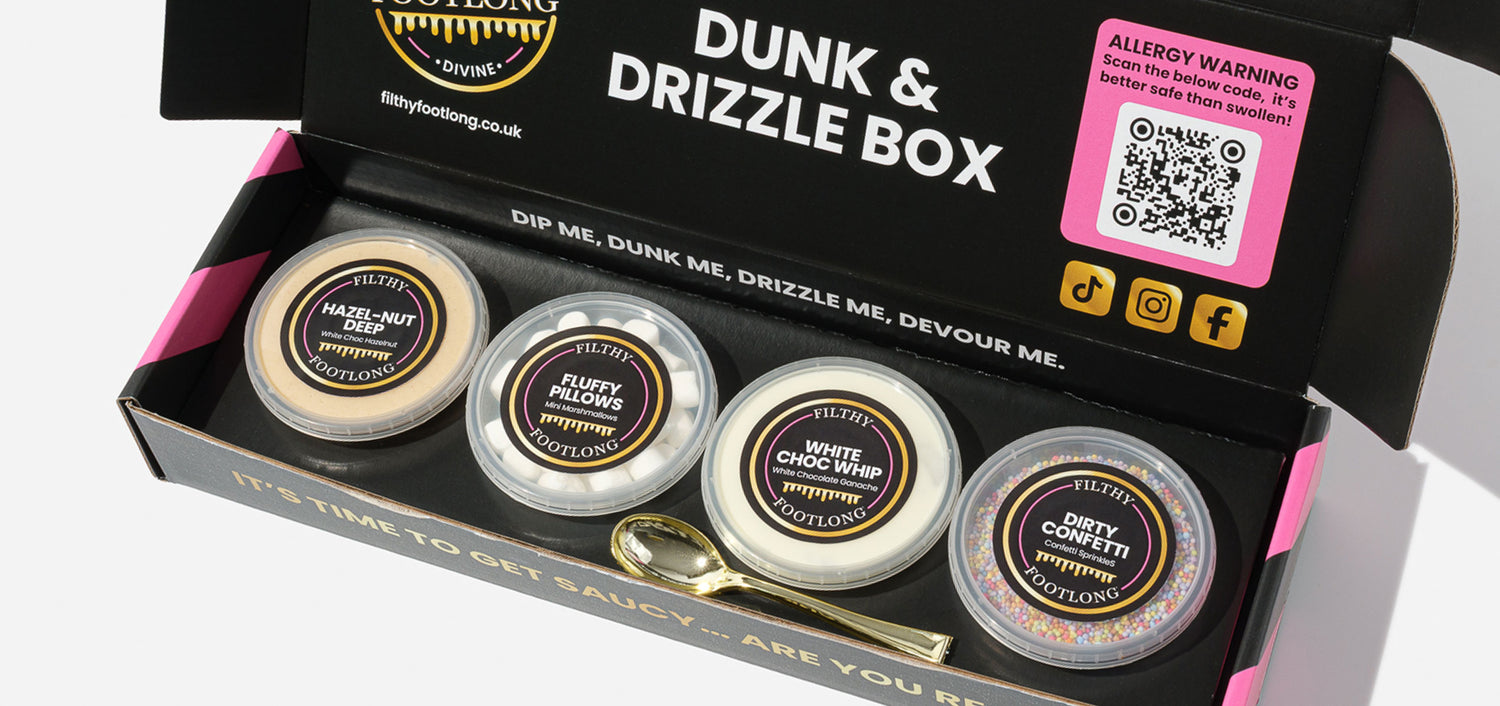 Dunk & Drizzle Box featuring four individual sauce pots, presented in a premium black gift box with printed text and a QR code linking to full allergen information.